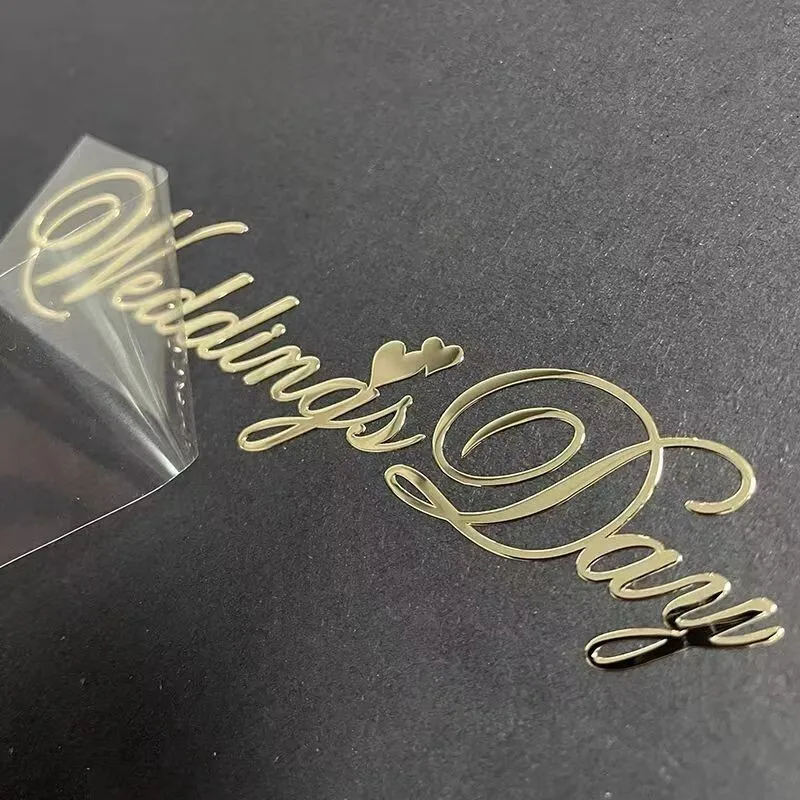 La différence entre les autocollants UV et les autocollants à transfert métallique